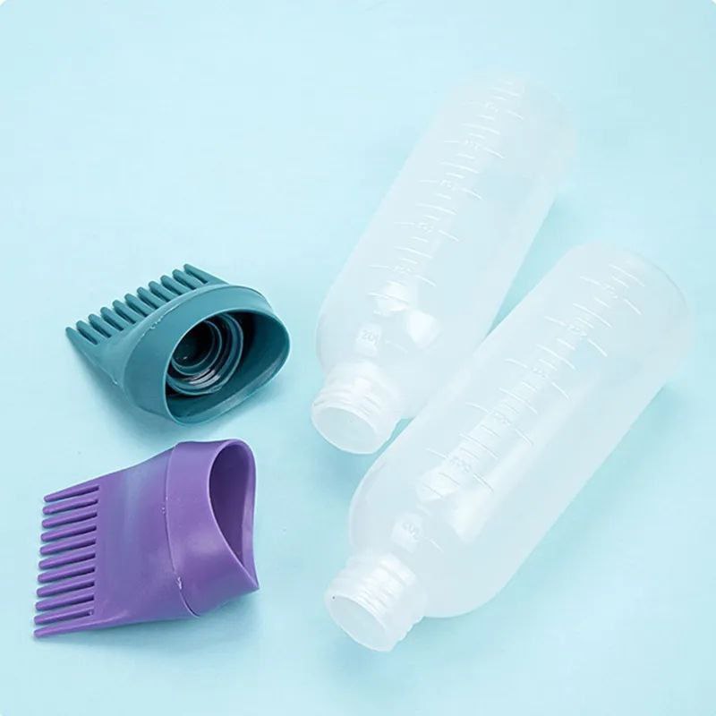 زجاجة توزيع مشط الجذور متدرجة القياس مصممة لتسهيل تطبيق صبغات الشعر والزيوت بدقة