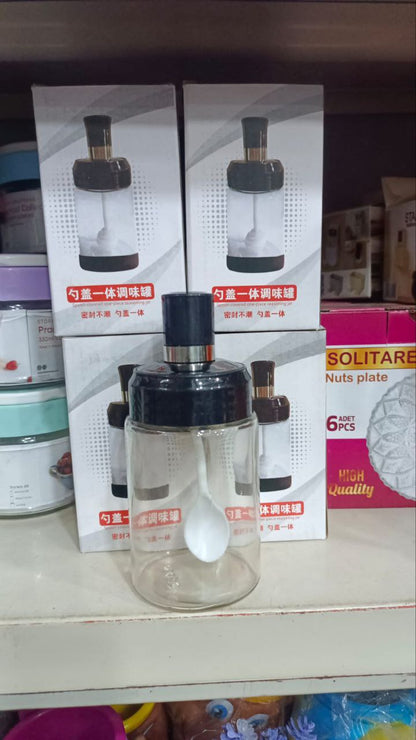 برطمان زجاج بالفرشاه او المعلقة