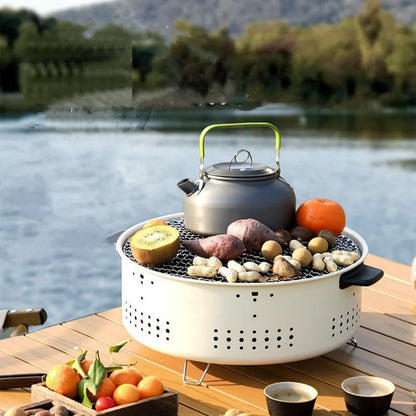 شواية فحم محمولة تجمع بين المتانة والعملية، مثالية للاستخدام المنزلي والتخييم. تصميمها الخفيف الوزن يسهل حملها في الرحلات،