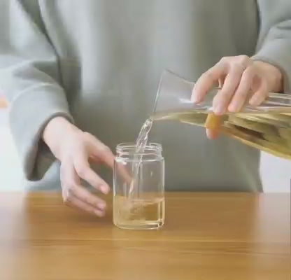 برطمان زجاج بالفرشاه او المعلقة